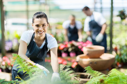 Trained gardener using PPE during outdoor work